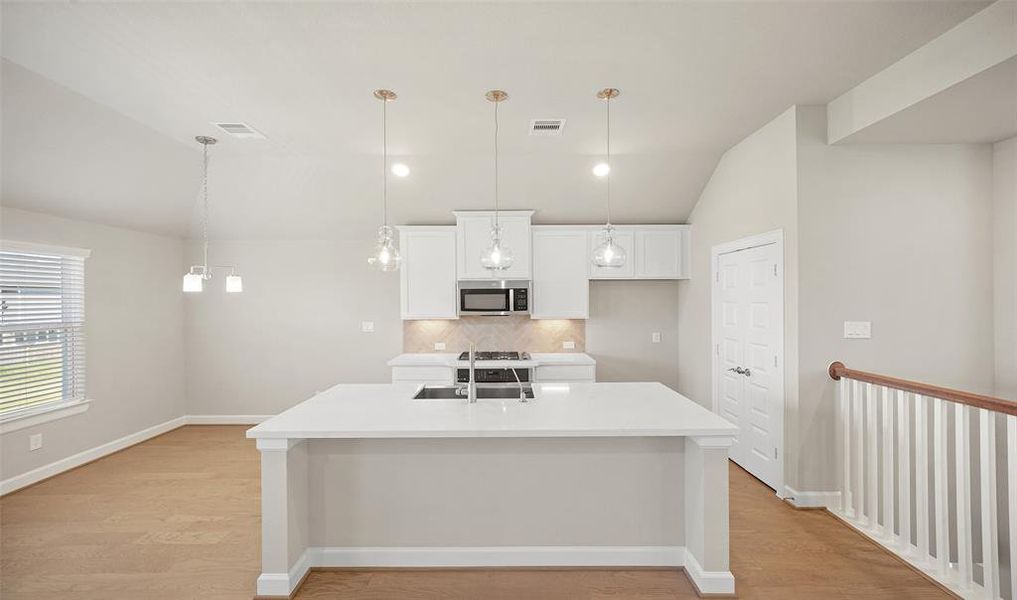 View of dining area and kitchen