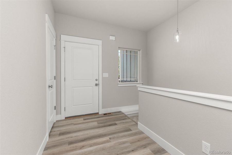 Entry foyer/stairs to basement