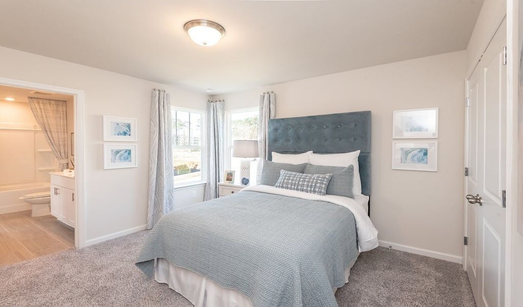 Two secondary bedrooms round out the upstairs.