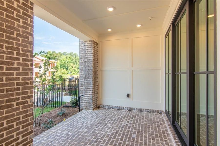 Covered Terrace Patio , leading to the Front Entry with Sliding Glass DOor