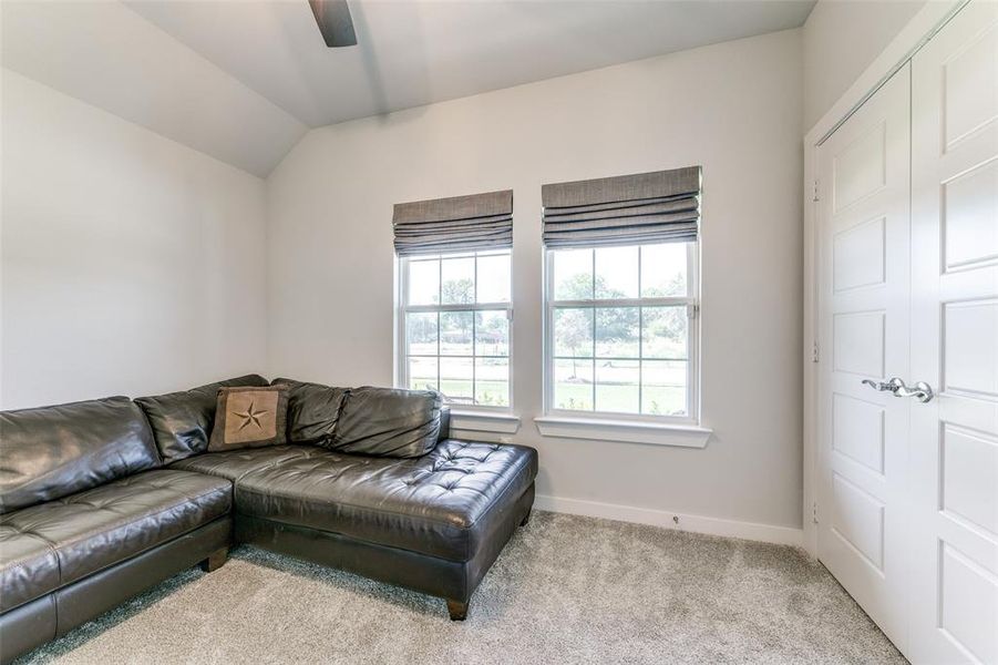 Bedroom #2 featuring lofted ceiling and ceiling fan