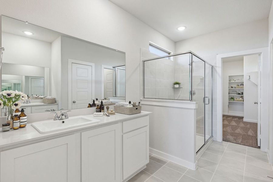 Primary bathroom in the Willow home plan by Trophy Signature Homes – REPRESENTATIVE PHOTO