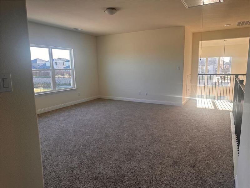 Empty room featuring carpet