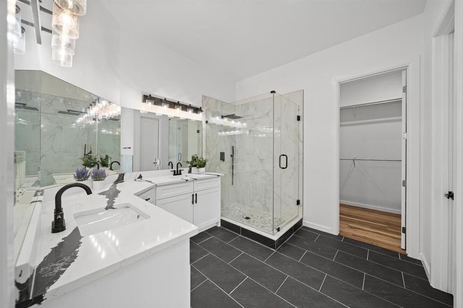 Bathroom with walk in shower, hardwood / wood-style floors, and dual bowl vanity