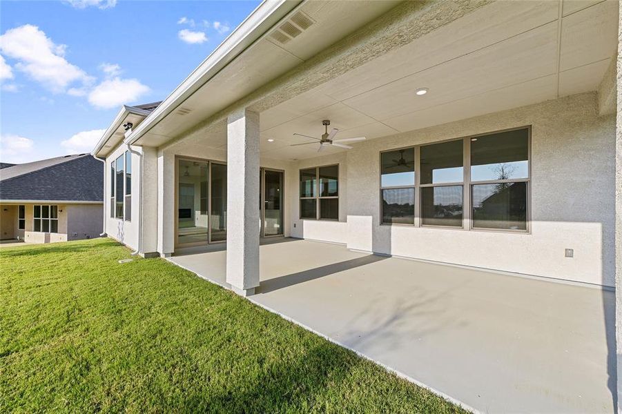 View of patio / terrace featuring ceiling fan.