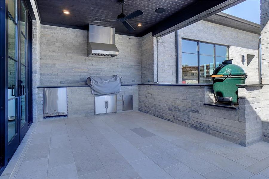 Outdoor Kitchen with Coyote Gas Grill, Green Egg, Fridge & Ice Storage Bin, Electric Shades...