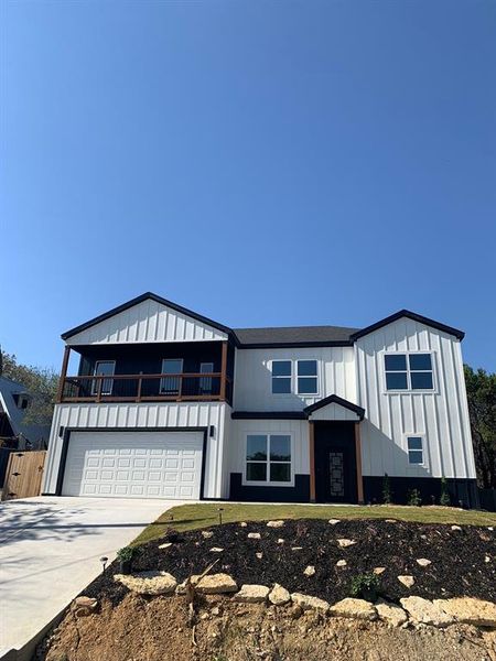 View of front of home with a garage