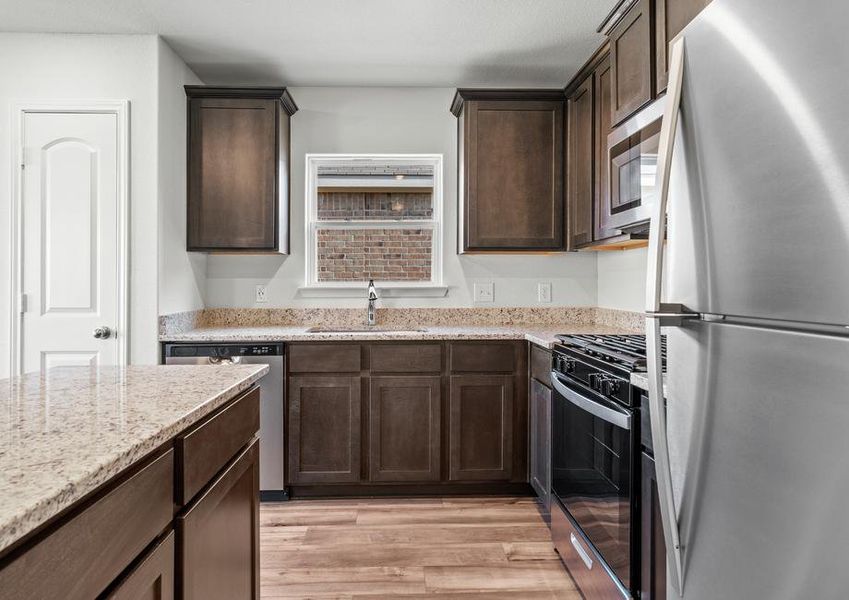 The kitchen of the Blanco has beautiful wood cabinets.