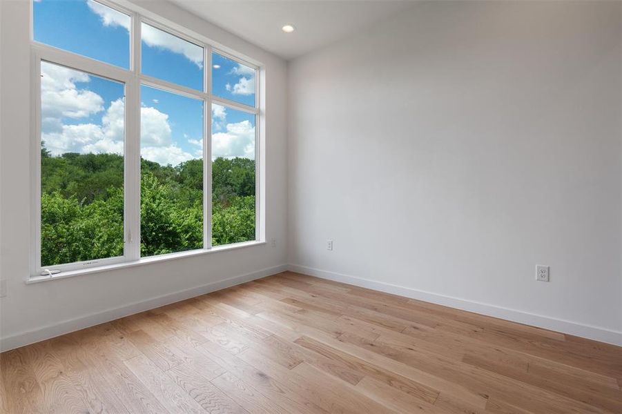 3rd floor features THREE bedrooms, two of which have amazing greenbelt views