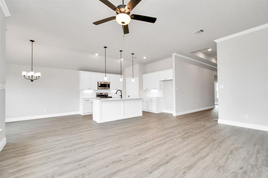 Open concept kitchen with kitchen island