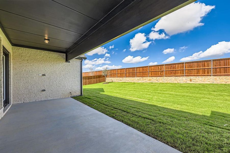 View of yard with a patio area