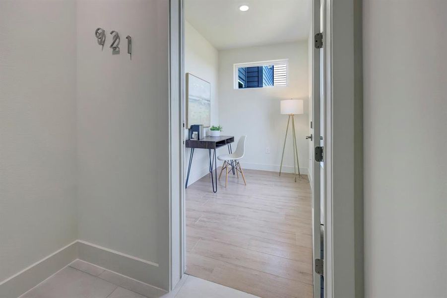 VIEW FROM COMMON AREA STAIRS LOOKING INTO CONDO #921, FLOOR PLAN A.