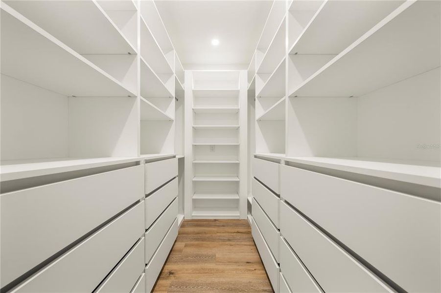 Custom Master suite closets big enough for his and hers