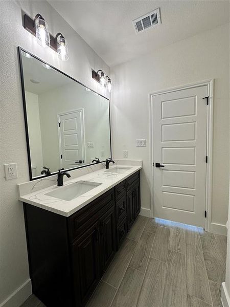 Bathroom featuring vanity