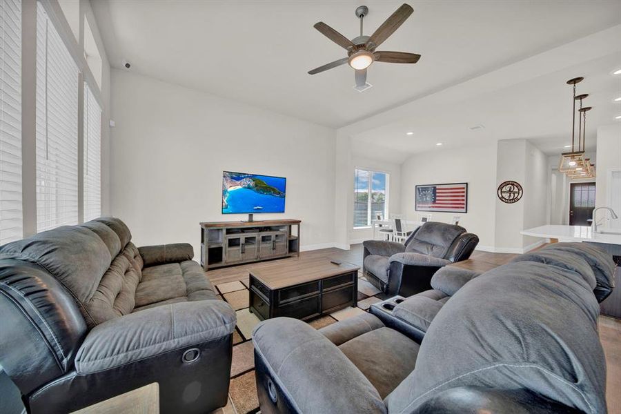 Open Living room overlooks breakfast and kitchen