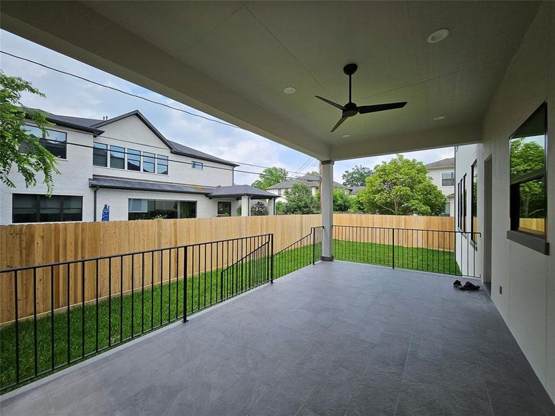 Enjoy the outdoor sitting on this spacious tiled covered patio