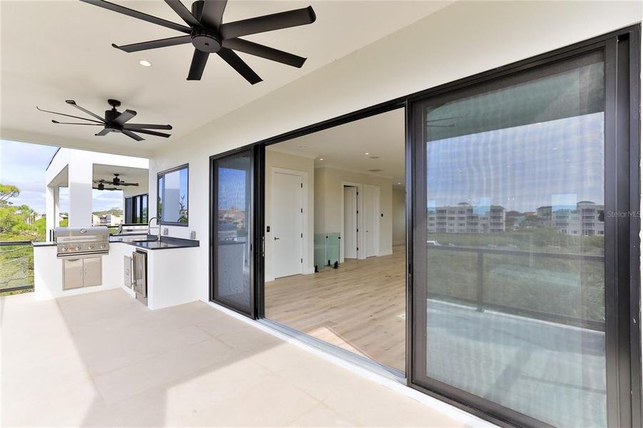 Large 3rd floor balcony with summer kitchen and endless sunsets