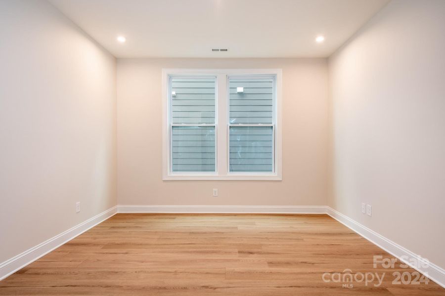 The possibilities are endless for this Flex space with gorgeous flooring and added recessed lighting.