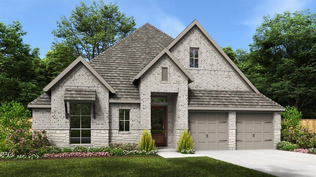 View of front of property with a front yard and a garage