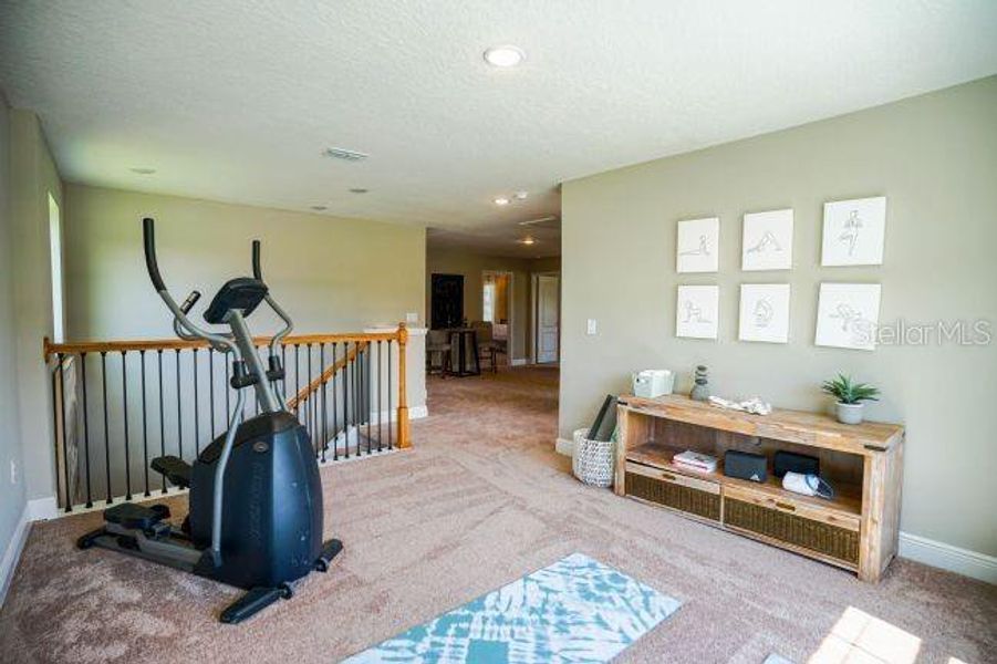 Loft Workout Room - Model home actual features may vary