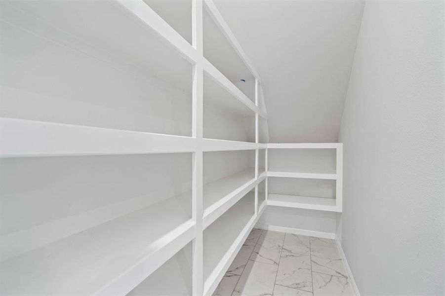 Huge walk in pantry with tons of storage