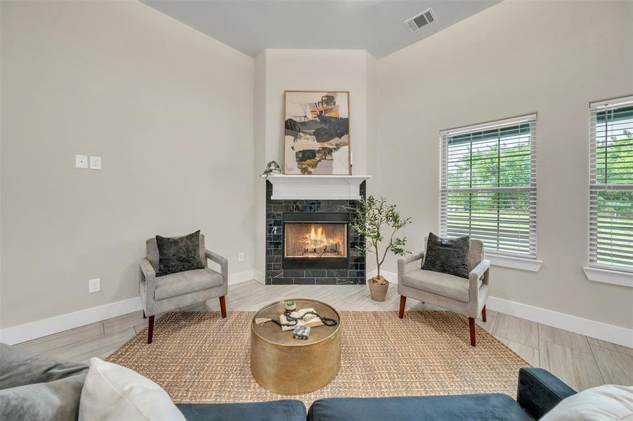 Sitting room with a fireplace