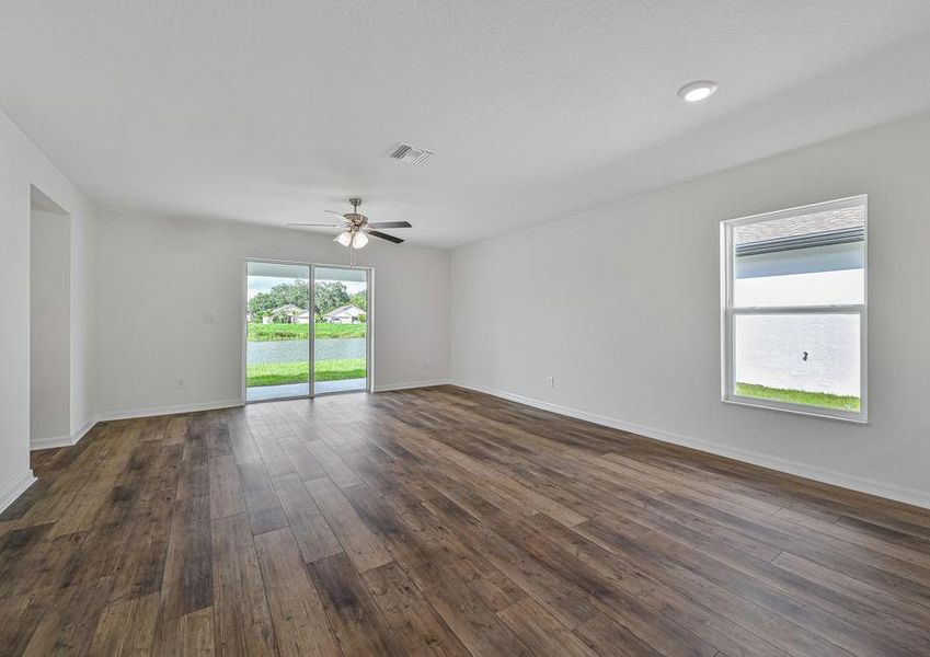 The family room has sliding glass doors that lead to the back patio