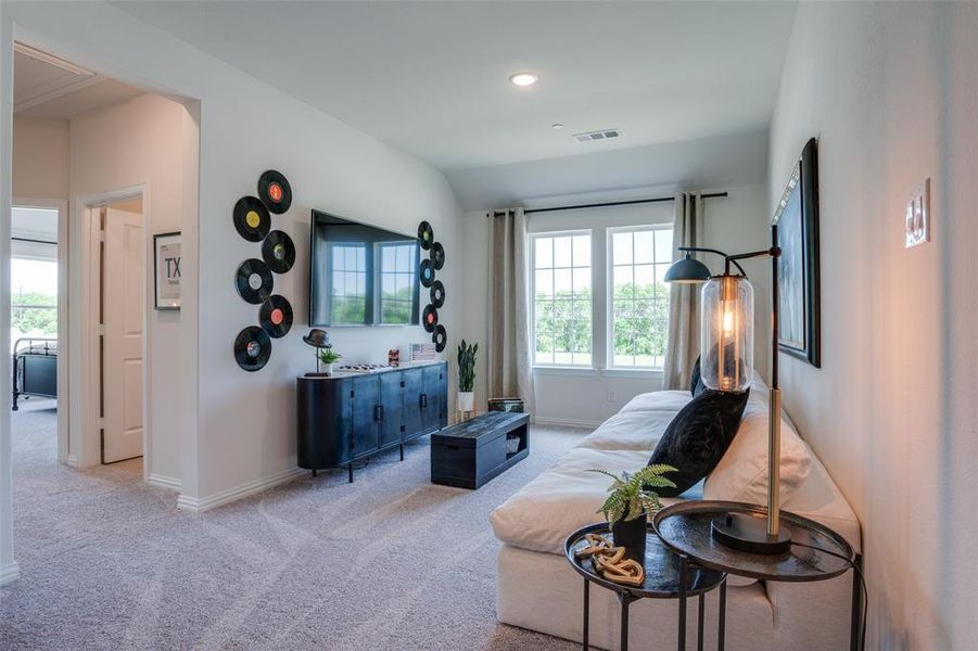 The upstairs game room is the perfect second family living space.