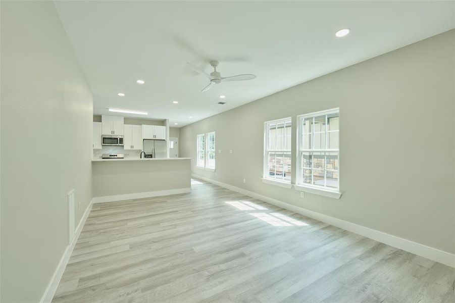 Family room looking towards the kitchen & front door