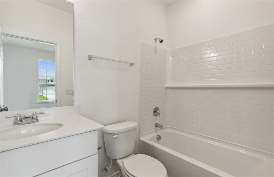 Upgraded secondary bathroom*real home pictured