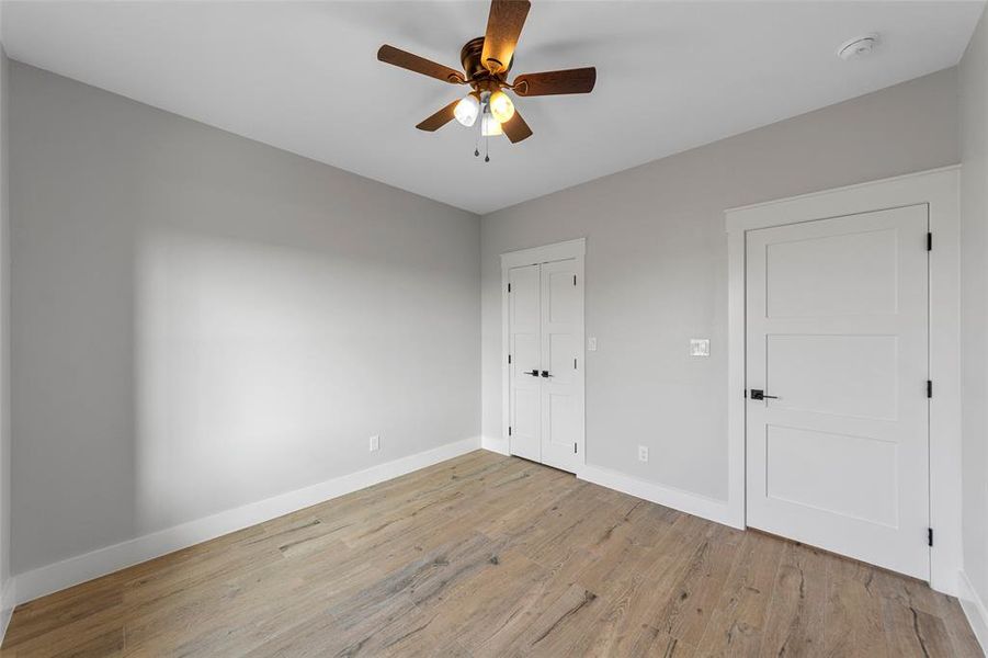 Bedroom 3 closet and entry door