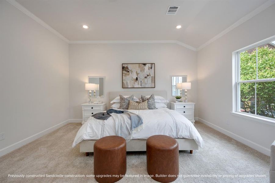 Ample space accommodates a king-size bed effortlessly, affirming the primary bedroom as a suite of grand proportions.