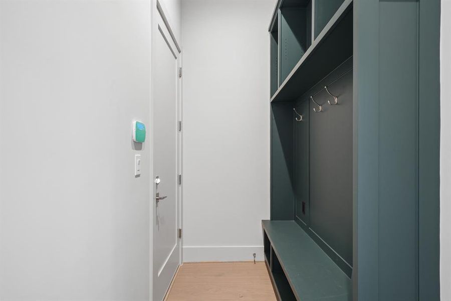 The mudroom offers the perfect spot to dump your shoes and keys as you come in from the garage!