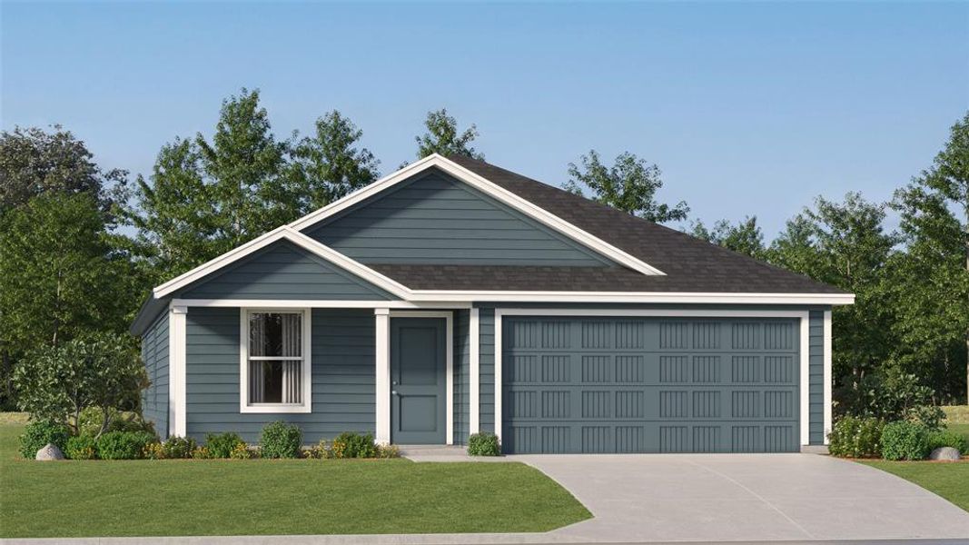 View of front of home featuring a front yard and a garage