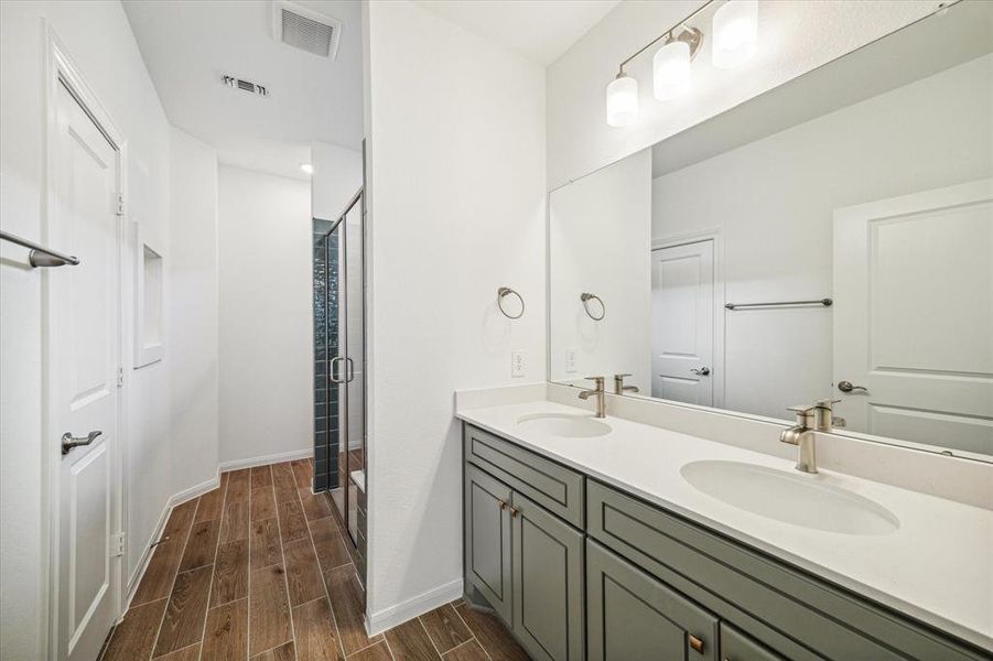 Primary bath with standup shower and double sinks