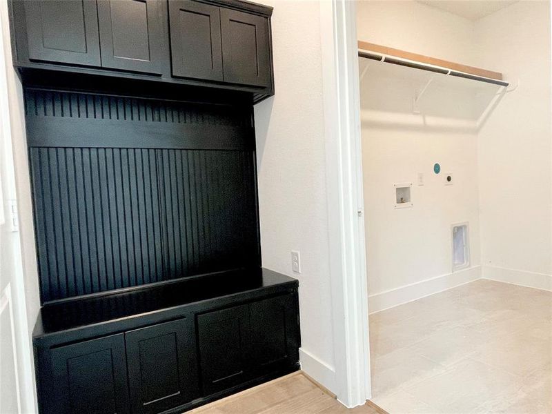 Mud Room Built Ins Next to the Sizable Utility Room