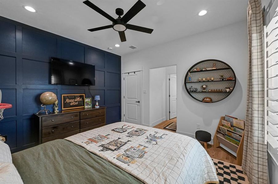 Bedroom #2 with Hollywood bathroom, and custom wood framed feature wall.