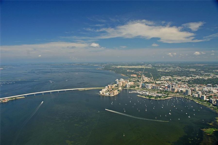 Aerial view of coastal Sarasota and Sarasota Bay and bridge leading to Bird Key, St Armand Key and Longboat Key