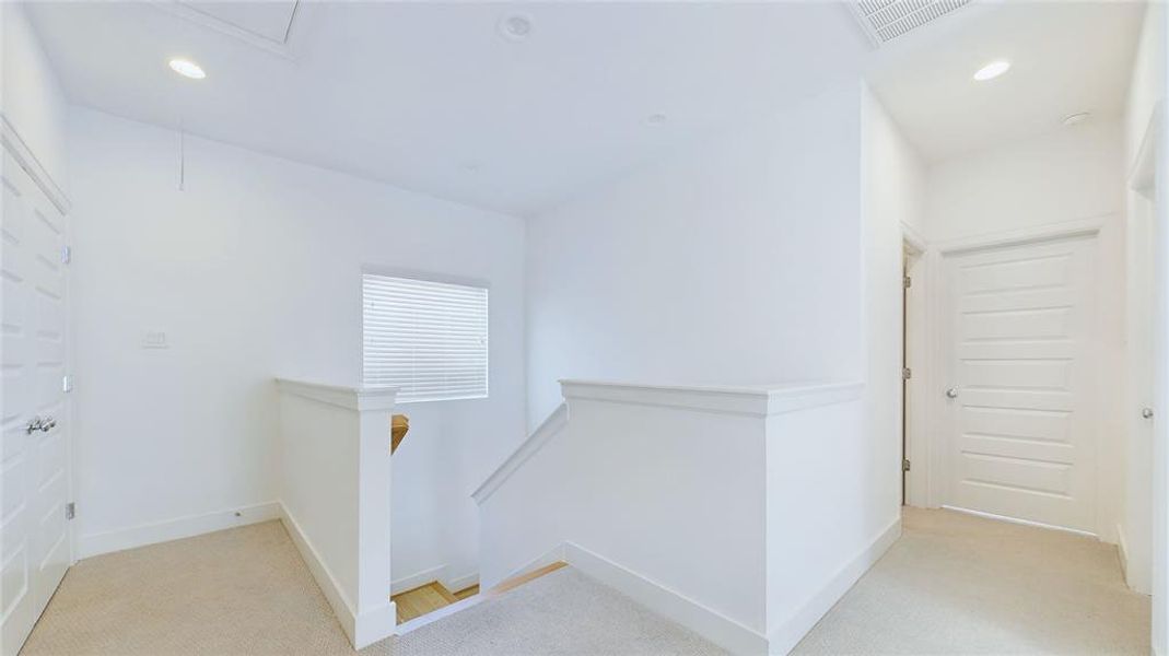 Second Floor Hallway and Laundry Closet including Washer and Dryer