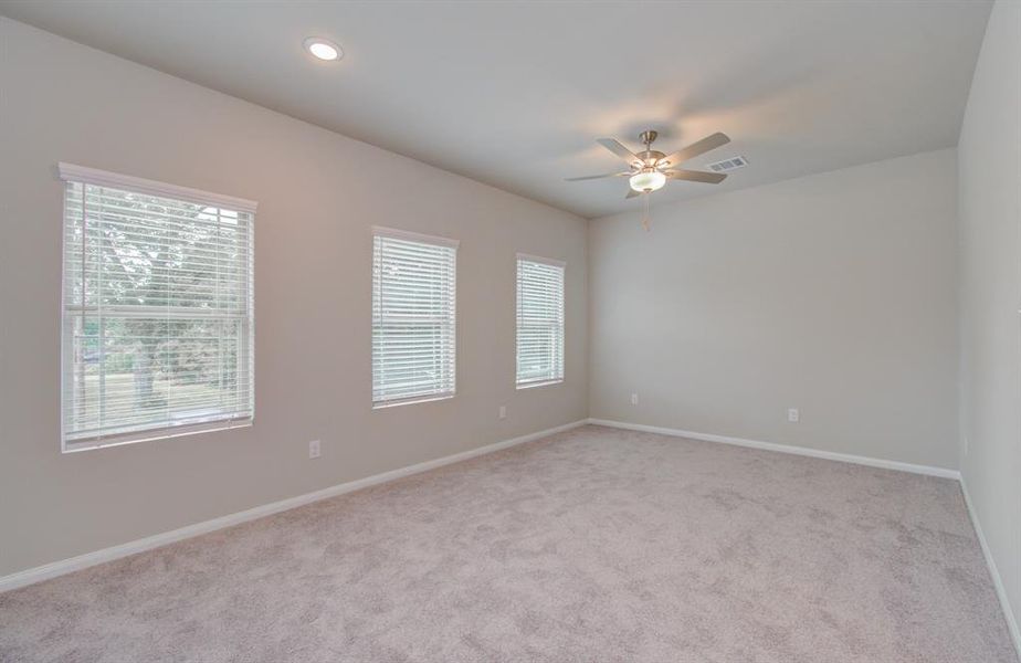 Spacious primary bedroom