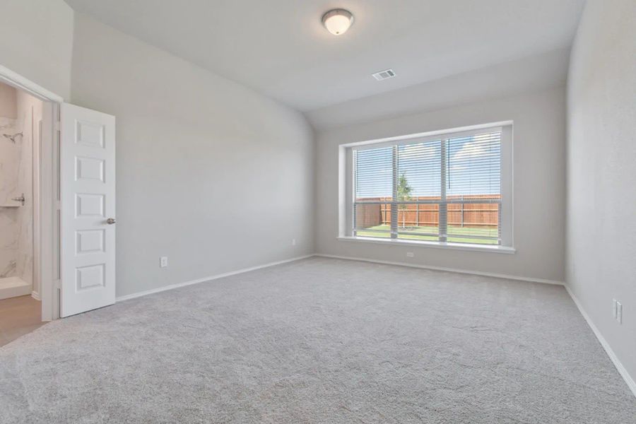 Primary Bedroom | Concept 2870 at Silo Mills - Select Series in Joshua, TX by Landsea Homes