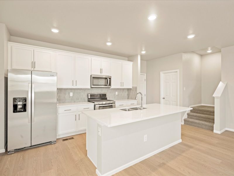 The Breckenridge floorplan interior image taken at a Meritage Homes community in Berthoud, CO.