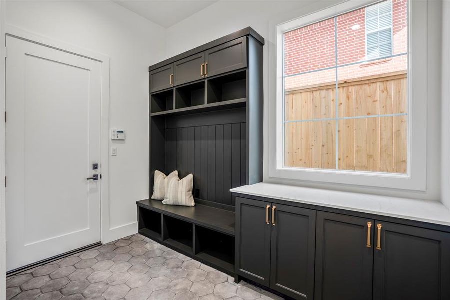 Incredible mud room with ample storage.