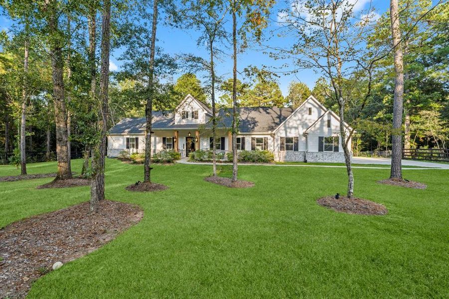 Just take a seat on this 36' long covered front porch.  Take in the smell of fresh air and listen to the sound of silence only interrupted by the birds talking to one another.  A place to truly relax and take it all in!