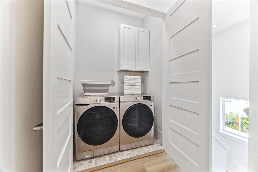 The laundry area is conveniently located on the third floor near the bedrooms and comes with a full sized washer and dryer included!