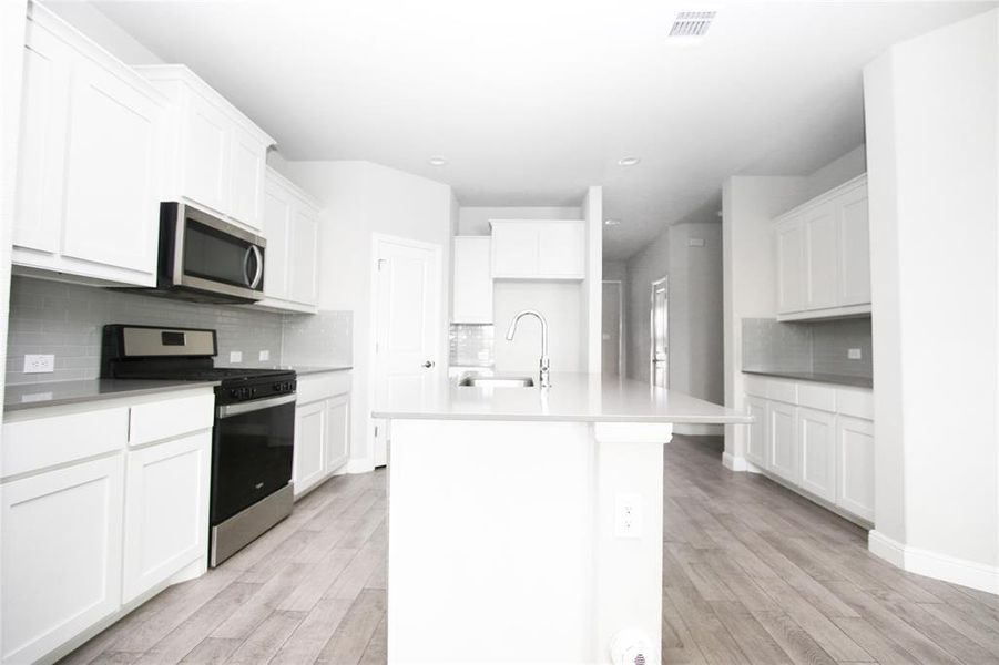 Open kitchen with a gas stove!