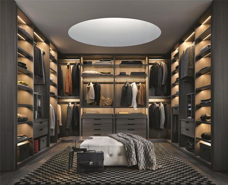 Exquisite primary closets can be completely customized and outfitted with Italian-made cabinetry solutions. Rendering shown is an example and may not be representative of this unit.