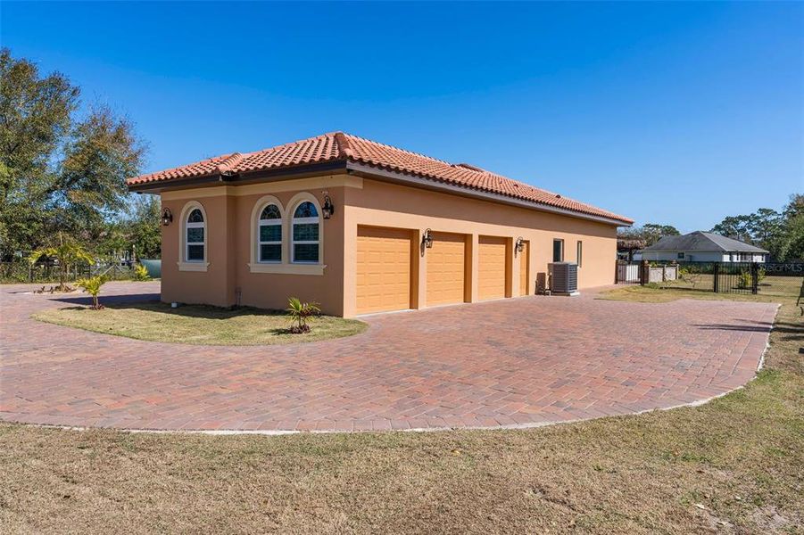 Triple Garage w/Private Entrance