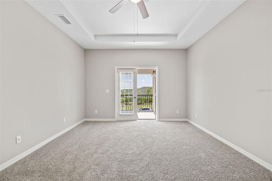 Primary Bedroom with French doors that lead to your own private balcony