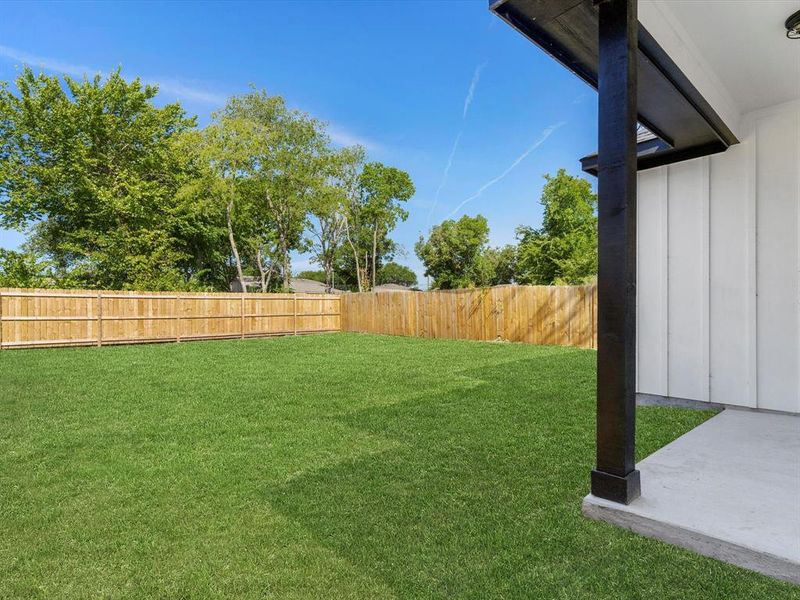 View of yard with a patio